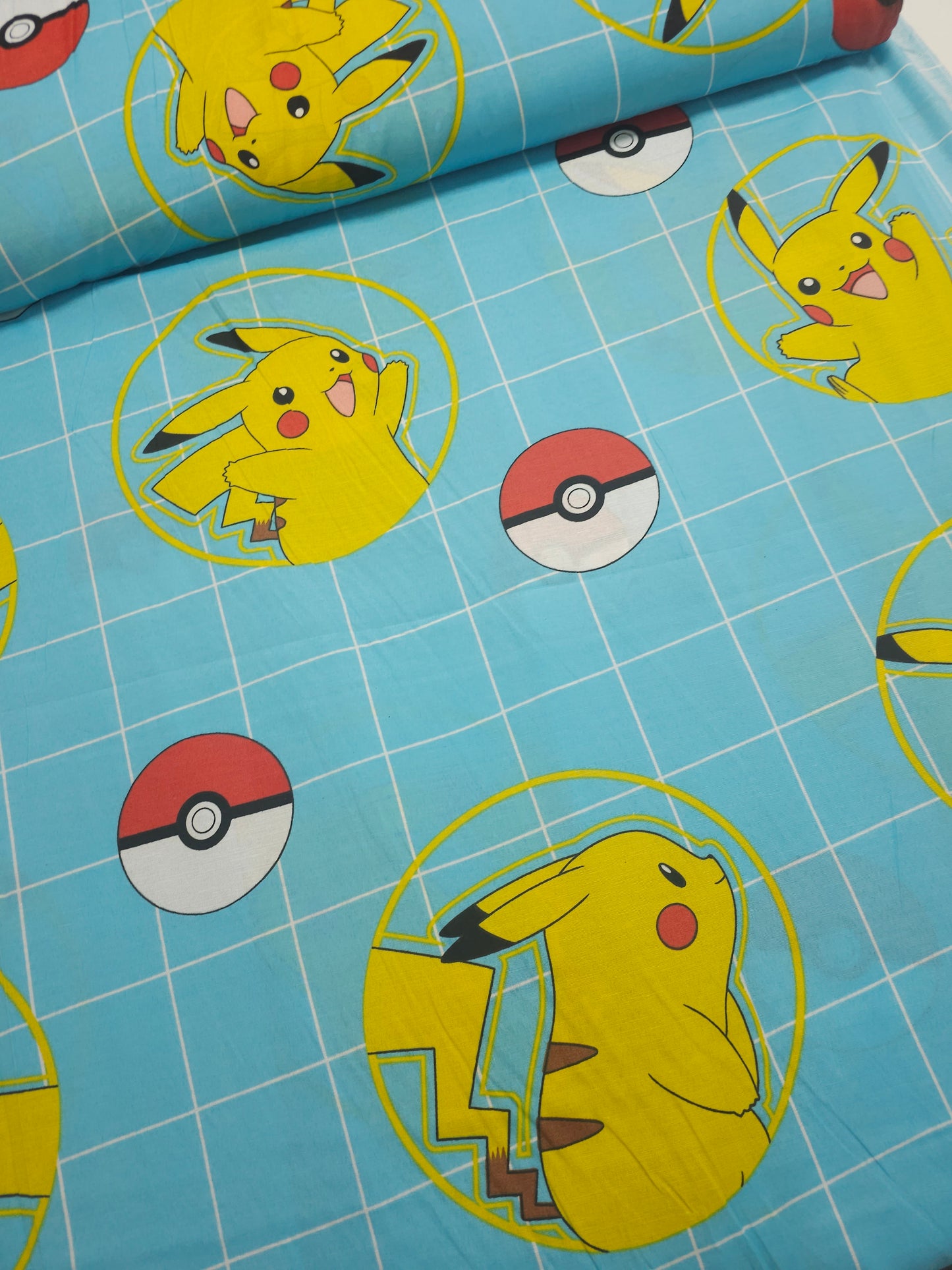 Light Blue Pokemon Check 100% Cotton 110"