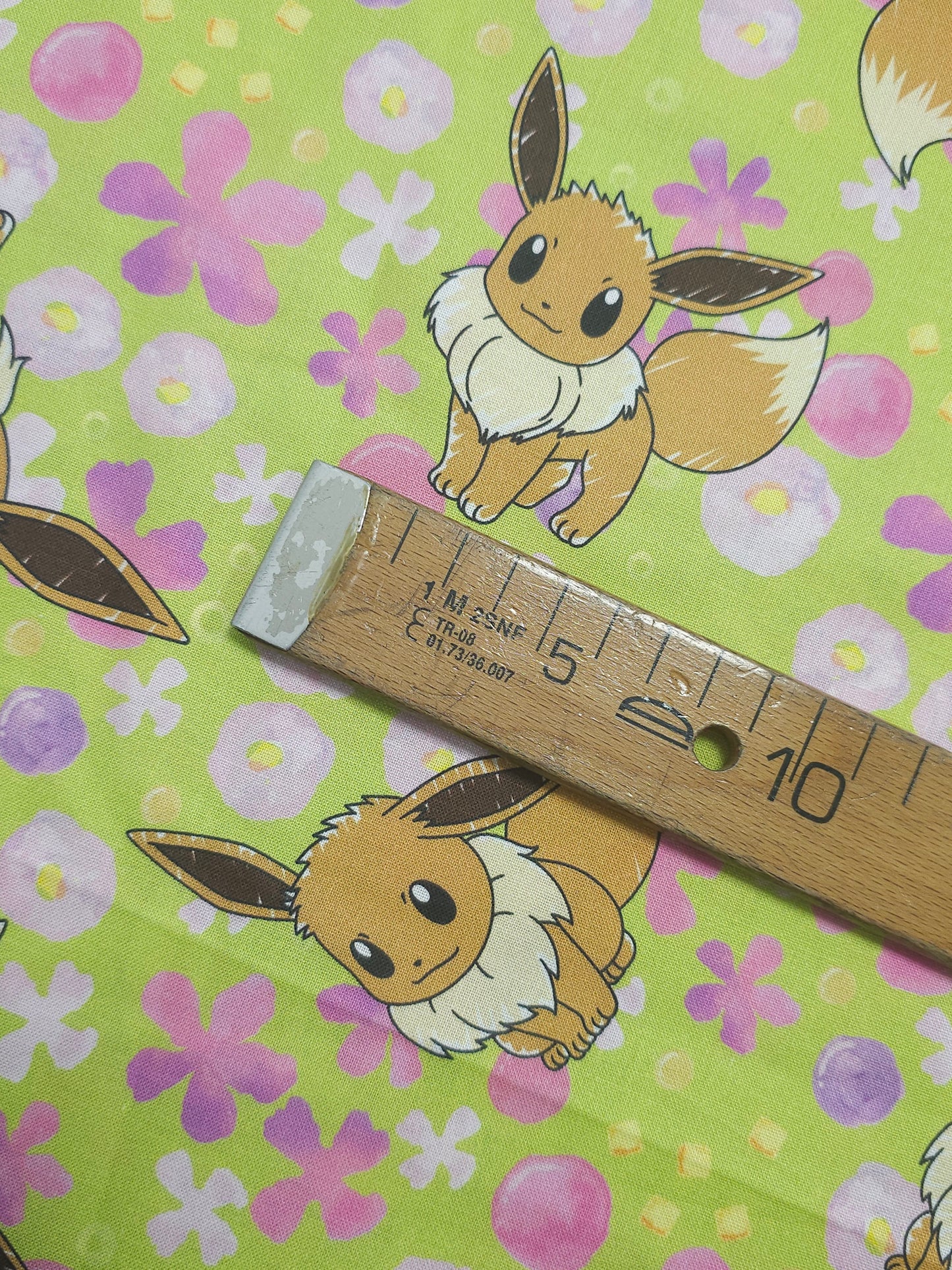 Lime Green Pokemon Eevee 100% Cotton - Robert Kaufman